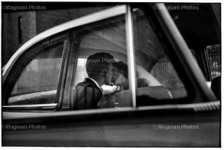 Elliott Erwitt, New York, Couple Kissing in Back of Car