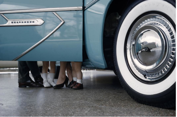 Elliott Erwitt, Family Standing by Car, New York, 1955